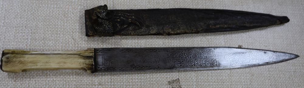 A bone handled Sudanese knife with lizard skin cover